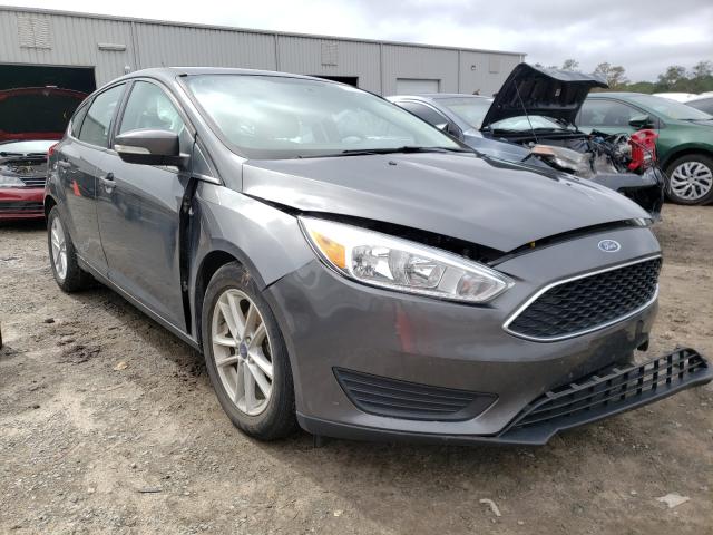 FORD FOCUS SE 2017 with VIN 1FADP3K23HL306302 - Photo from auction