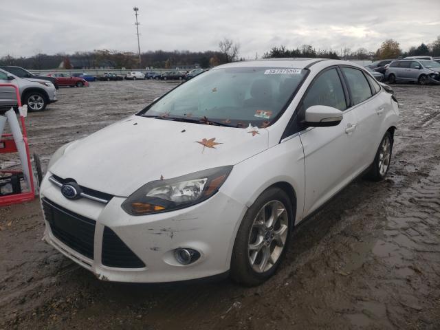 Photo 2 from auction – 2013 FORD FOCUS TITA with VIN 1FADP3J27DL378552
