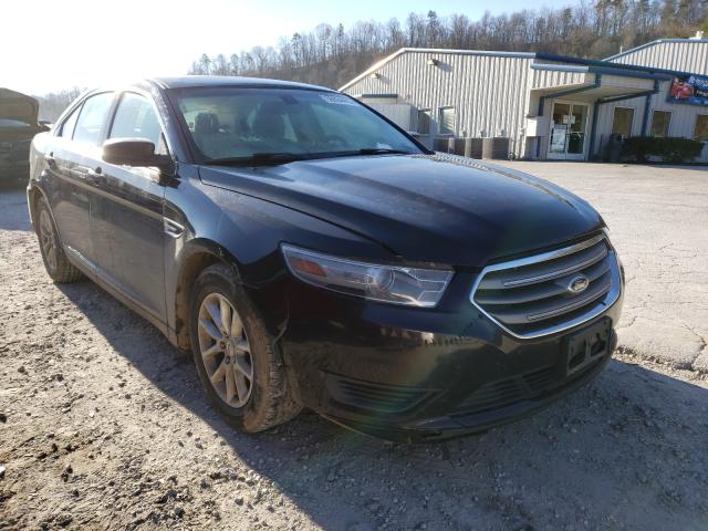 FORD TAURUS SE 2014 with VIN 1FAHP2D84EG133150 - Photo from auction