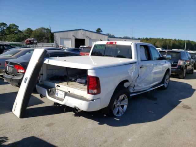 Photo 4 from auction – 2014 RAM 1500 SPORT with VIN 1C6RR7MT4ES301447