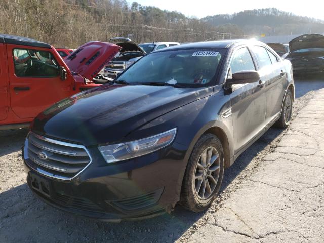 Photo 2 from auction – 2014 FORD TAURUS SE with VIN 1FAHP2D84EG133150