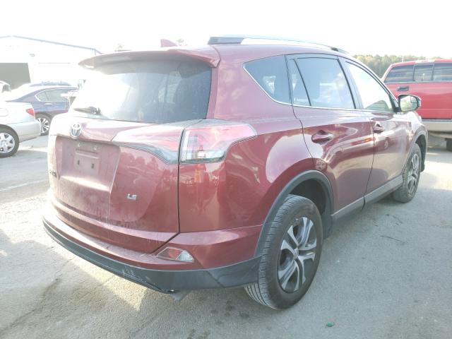 Photo 4 from auction – 2018 TOYOTA RAV4 LE with VIN JTMZFREV0JD112192