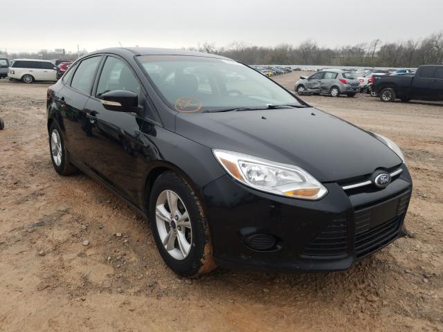 FORD FOCUS SE 2014 with VIN 1FADP3F21EL460934 - Photo from auction