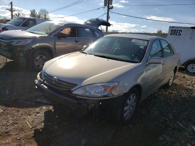 Photo 2 from auction – 2004 TOYOTA CAMRY LE with VIN 4T1BF32K14U577928