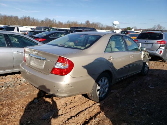 Photo 4 from auction – 2004 TOYOTA CAMRY LE with VIN 4T1BF32K14U577928