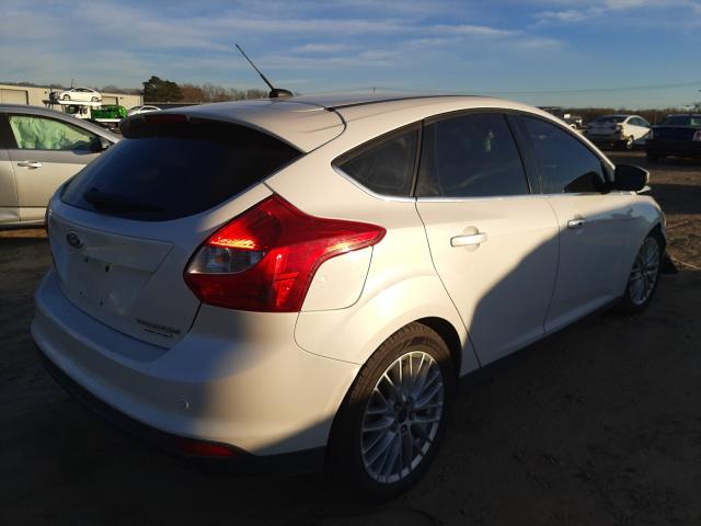 Photo 4 from auction – 2014 FORD FOCUS TITA with VIN 1FADP3N27EL416941