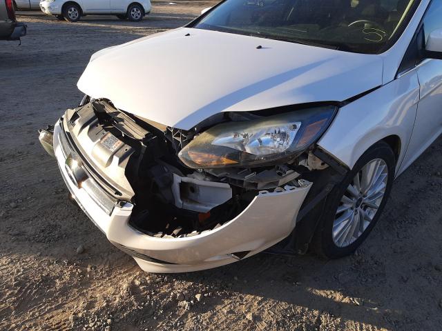 Photo 10 from auction – 2014 FORD FOCUS TITA with VIN 1FADP3N27EL416941