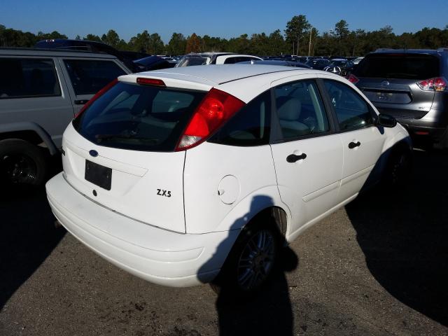 Photo 4 from auction – 2003 FORD FOCUS ZX5 with VIN 3FAFP37Z43R151252