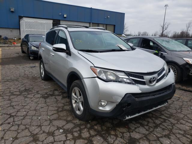 TOYOTA RAV4 XLE 2014 with VIN 2T3RFREV4EW164630 - Photo from auction