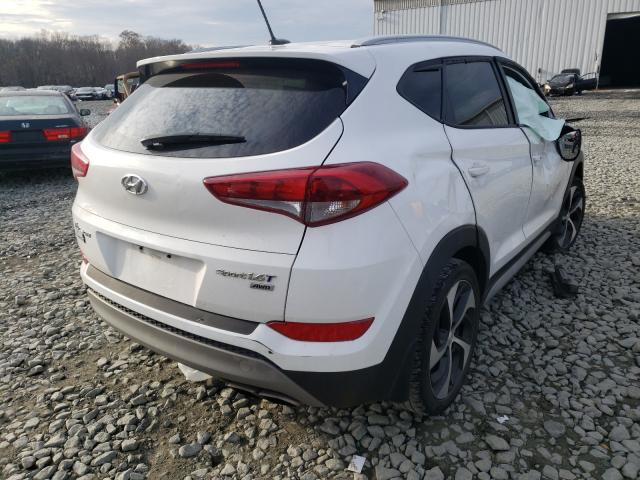 Photo 4 from auction – 2017 HYUNDAI TUCSON LIM with VIN KM8J3CA24HU382384
