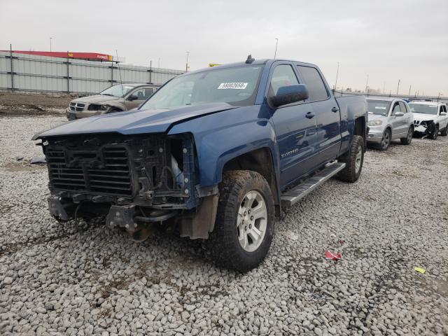 Photo 2 from auction – 2018 CHEVROLET SILVERADO with VIN 3GCUKREC0JG102205