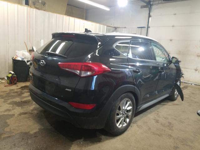 Photo 4 from auction – 2018 HYUNDAI TUCSON SEL with VIN KM8J3CA4XJU746802
