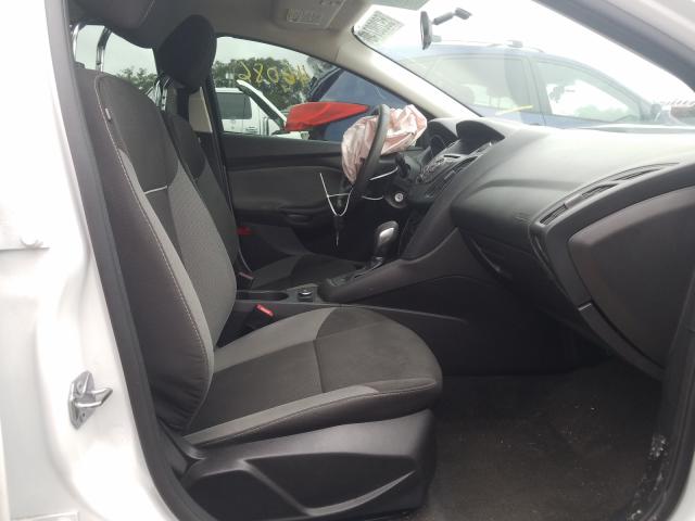 Photo 5 from auction – 2014 FORD FOCUS S with VIN 1FADP3E23EL391567