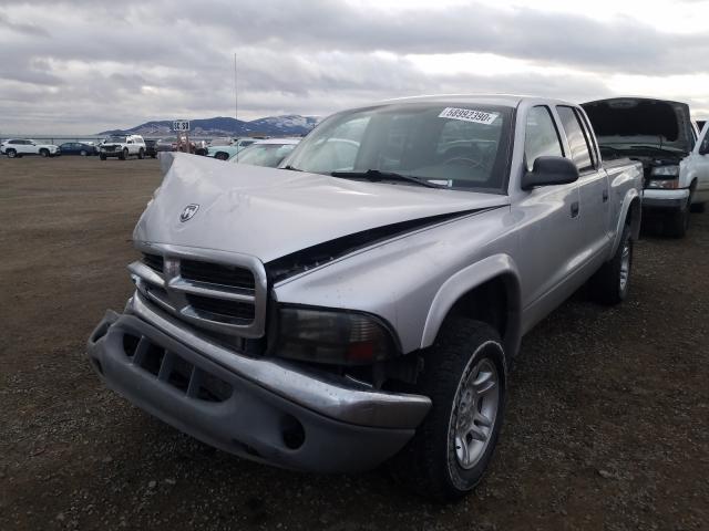 Photo 2 from auction – 2004 DODGE DAKOTA QUA with VIN 1D7HG48N34S716543
