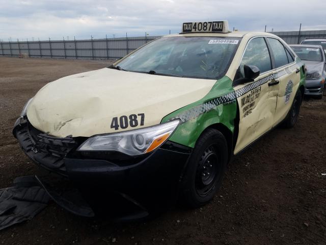 Photo 2 from auction – 2016 TOYOTA CAMRY HYBR with VIN 4T1BD1FK9GU189886