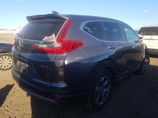 Photo 4 from auction – 2018 HONDA CR-V EX with VIN 7FARW2H58JE018349
