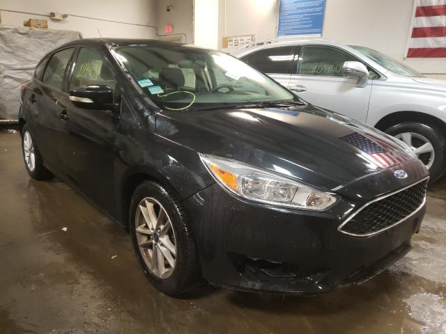FORD FOCUS SE 2015 with VIN 1FADP3K21FL249515 - Photo from auction