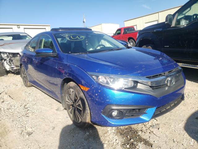 HONDA CIVIC EX 2018 with VIN 19XFC1F31JE002437 - Photo from auction