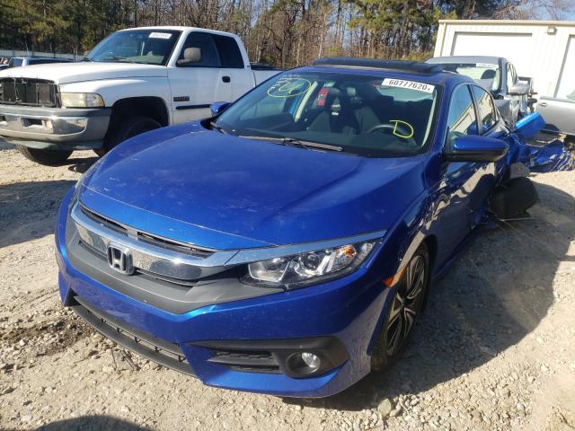Photo 2 from auction – 2018 HONDA CIVIC EX with VIN 19XFC1F31JE002437