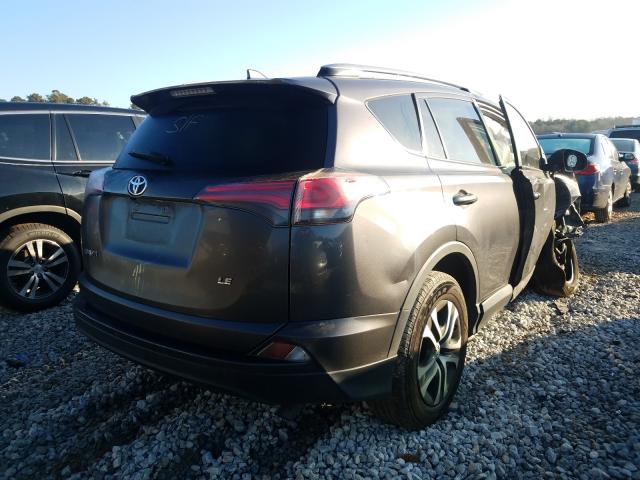 Photo 4 from auction – 2017 TOYOTA RAV4 LE with VIN JTMZFREVXHJ704291