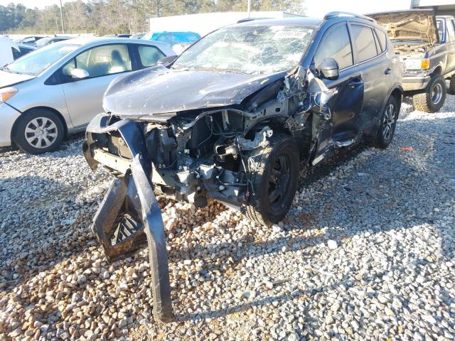 Photo 2 from auction – 2017 TOYOTA RAV4 LE with VIN JTMZFREVXHJ704291