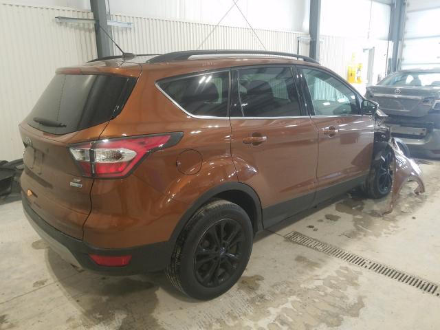 Photo 4 from auction – 2017 FORD ESCAPE SE with VIN 1FMCU9GD6HUB43162