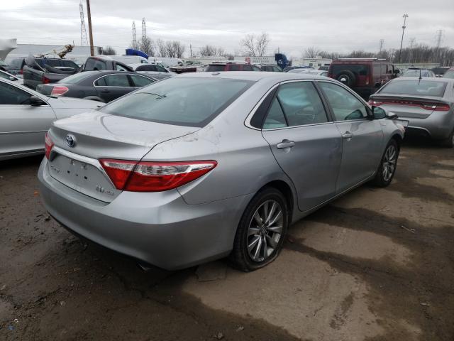 Photo 4 from auction – 2016 TOYOTA CAMRY HYBR with VIN 4T1BD1FK4GU183655