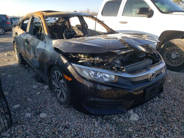 HONDA CIVIC EX 2018 with VIN 19XFC2F76JE016388 - Photo from auction