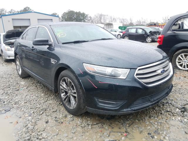 FORD TAURUS SEL 2014 with VIN 1FAHP2E87EG175648 - Photo from auction