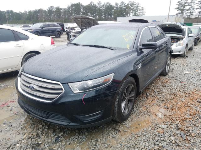 Photo 2 from auction – 2014 FORD TAURUS SEL with VIN 1FAHP2E87EG175648