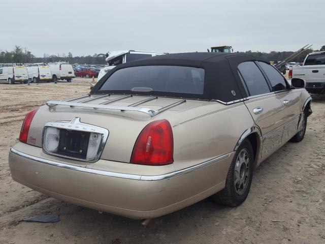 Photo 4 from auction – 1998 LINCOLN TOWN CAR E with VIN 1LNFM81W8WY641564