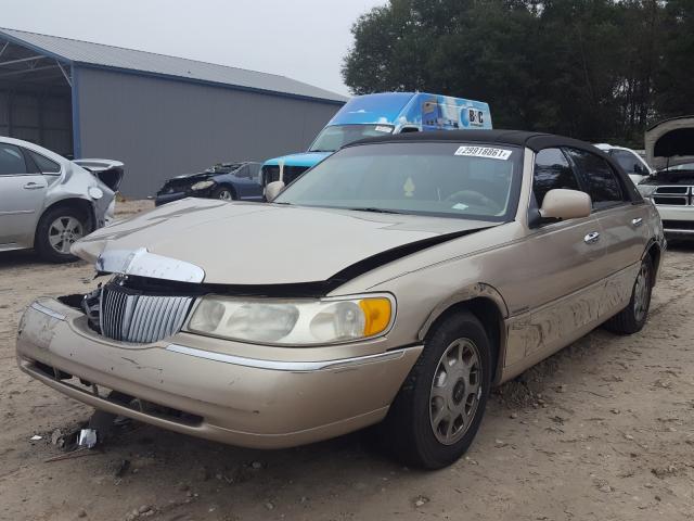 Photo 2 from auction – 1998 LINCOLN TOWN CAR E with VIN 1LNFM81W8WY641564
