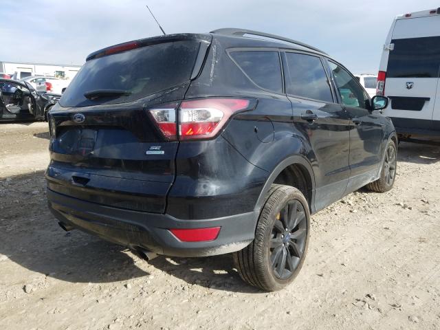 Photo 4 from auction – 2017 FORD ESCAPE SE with VIN 1FMCU0GD1HUD25847