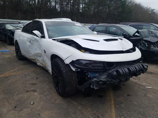 DODGE CHARGER SR 2018 with VIN 2C3CDXL9XJH326877 - Photo from auction