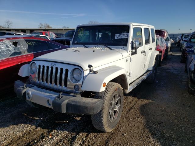 Photo 2 from auction – 2014 JEEP WRANGLER U with VIN 1C4BJWEG2EL295574