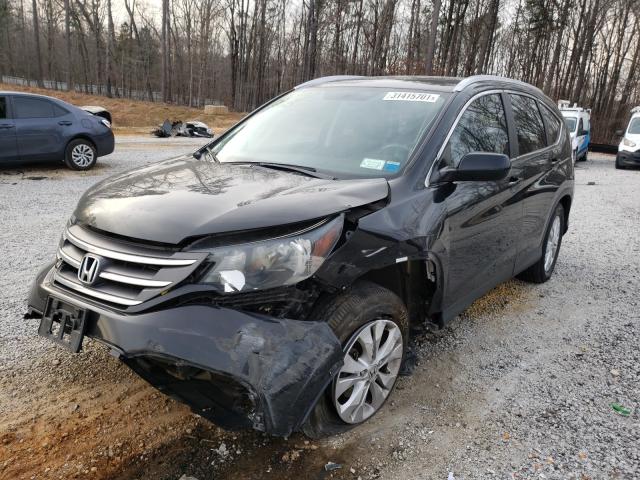Photo 2 from auction – 2014 HONDA CR-V EXL with VIN 5J6RM4H76EL077847