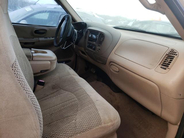Photo 5 from auction – 1999 FORD F-150 with VIN 2FTRX17W7XCA22003