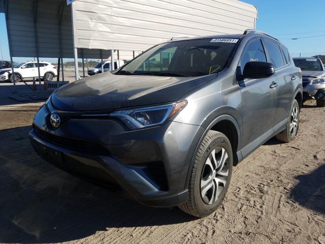 Photo 2 from auction – 2018 TOYOTA RAV4 LE with VIN 2T3ZFREV6JW458024