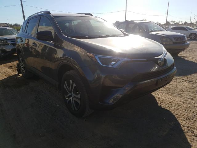 TOYOTA RAV4 LE 2018 with VIN 2T3ZFREV6JW458024 - Photo from auction