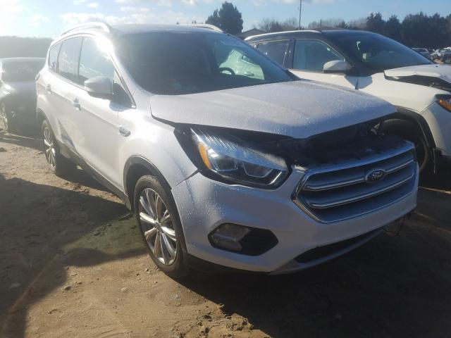 FORD ESCAPE TIT 2017 with VIN 1FMCU9JDXHUC64382 - Photo from auction