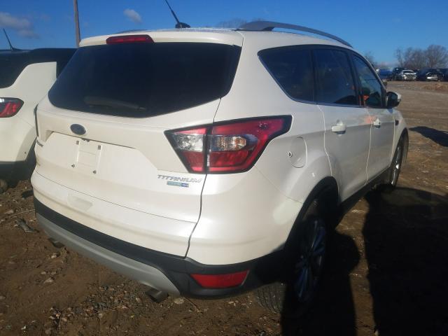 Photo 4 from auction – 2017 FORD ESCAPE TIT with VIN 1FMCU9JDXHUC64382