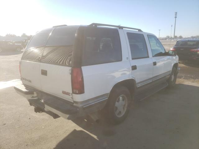 Photo 4 from auction – 1999 GMC YUKON with VIN 1GKEC13R8XJ793232