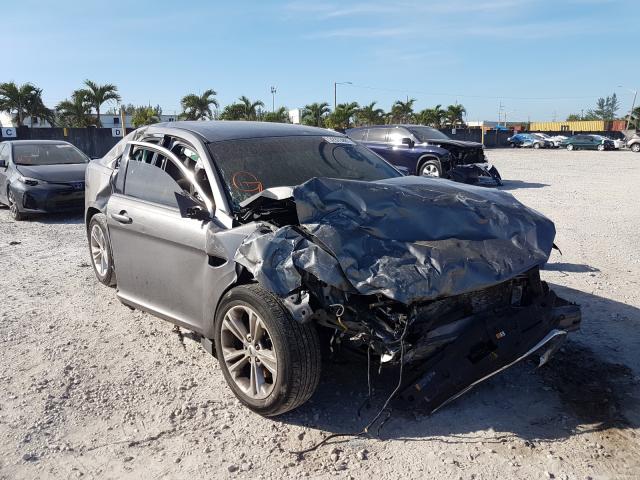 FORD TAURUS SEL 2014 with VIN 1FAHP2E82EG166744 - Photo from auction