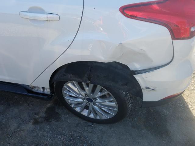 Photo 10 from auction – 2016 FORD FOCUS TITA with VIN 1FADP3N21GL259815