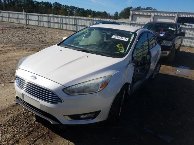 Photo 2 from auction – 2016 FORD FOCUS TITA with VIN 1FADP3N21GL259815