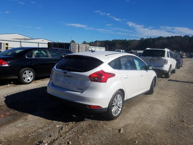 Photo 4 from auction – 2016 FORD FOCUS TITA with VIN 1FADP3N21GL259815