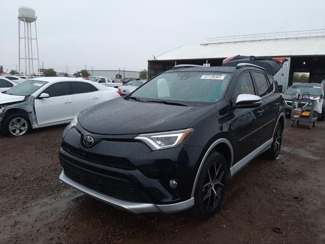 Photo 2 from auction – 2016 TOYOTA RAV4 SE with VIN JTMJFREVXGJ069004