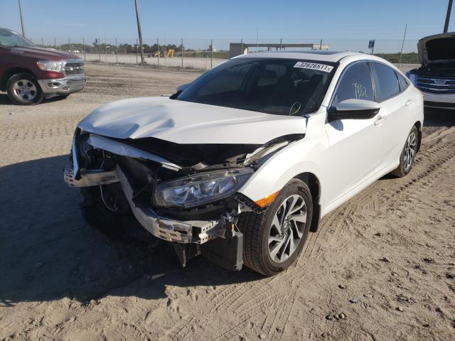 Photo 2 from auction – 2018 HONDA CIVIC EX with VIN 19XFC2F78JE012567