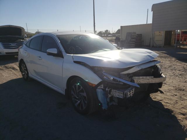 HONDA CIVIC EX 2018 with VIN 19XFC2F78JE012567 - Photo from auction