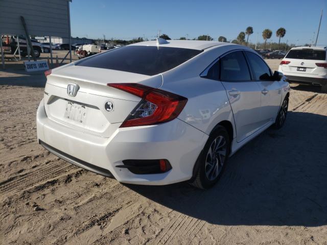 Photo 4 from auction – 2018 HONDA CIVIC EX with VIN 19XFC2F78JE012567